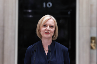 Prime Minister Liz Truss in front of Number 10 Downing Street.