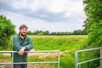 BBOWT Senior Land Manager Tom Hayward in the grazing fields at Woolley Firs.