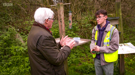 Countryfile presenter John Craven interviews teenage volunteer Dylan about his work at College Lake as part of the show's Review of the Year episode in January 2022. Still taken from iPlayer.
