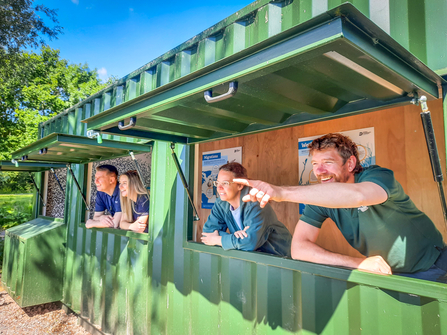 Staff from BBOWT and Grundon in the new lakeside bird hide at the Nature Discovery Centre