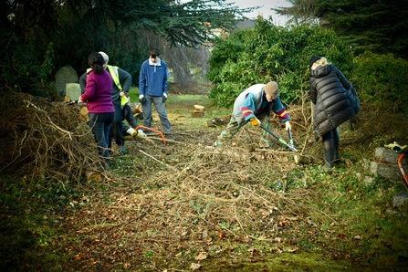 Volunteers clearing vegetation at Reading Old Cemetery