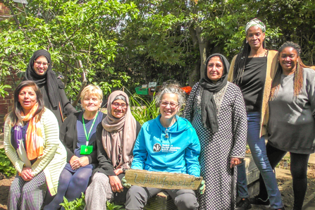 BBOWT Community Officer Barbara Polonara with members of the Slough Ujala Foundation community in the new community garden. Picture: Pete Hughes