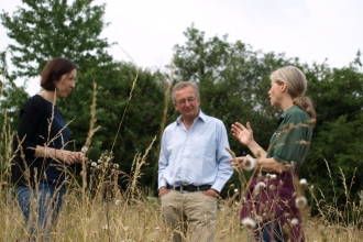 Dieter Helm talks to BBOWT's Lisa and Prue at Chimney Meadows