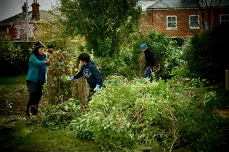 Volunteers clearing vegetation at Reading Old Cemetery