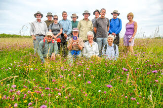 BBOWT volunteers at the Coronation Meadow at Chimney Meadows nature reserve