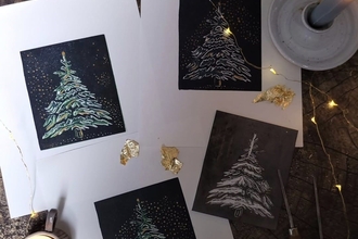 Christmas trees made using linocut method