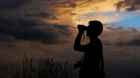 Man with binoculars