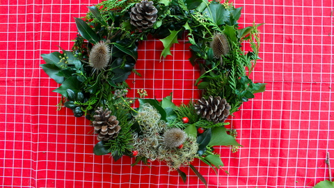 A seasonal wreath made from natural materials provided in our Christmas wreath kit.