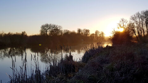 Sunrise at Cholsey Marsh by Charlotte Day - winner of the landscape category at the BBOWT Photography Competition 2022.