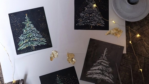 Christmas trees made using linocut method