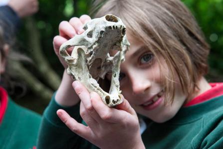 Girl with badger skull