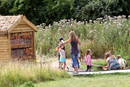 family near bug hotel