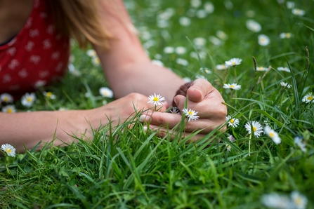 Woman with daisies