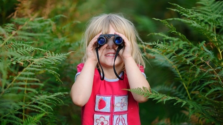 Girl with binoculars