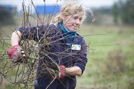 Young volunteers scrub clearing