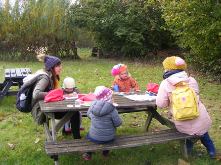 Nature Tots using new kits outside