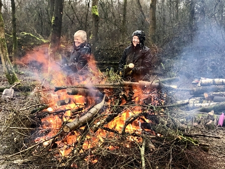 Volunteers and bonfire