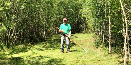 A BBOWT volunteer scything in Finemere Wood. Photo by Charlotte Karmali