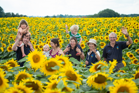 The Watts family who run Vine House Farm in Lincolnshire and give some of the profits from their sunflower seed-based birdseed mix to The Wildlife Trusts. Pictured far right is Nicholas Watts, with his daughter and farm manager Lucy Taylor pictured centre. Picture: Matthew Roberts