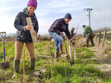 Volunteers from the Hedgerow Havens and Weedon village join forces to plant new species rich hedgerow and create a wildflower meadow at Rectory Farm near Weedon. Picture: Marcus Militello