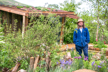 Jamie Langlands of Oxford Garden Design at at BBOWT and the Wildlife Trusts' garden at the 2023 RHS Malvern Spring Festival, created with Oxford Garden Design, Charlie Luxton and Future Nature.
