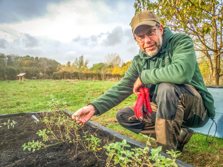 BBOWT Community Officer Ed Munday in the community garden at the Trust's Nature Discovery Centre