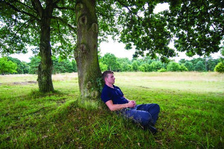 A man spending time in nature for his mental health and wellbeing