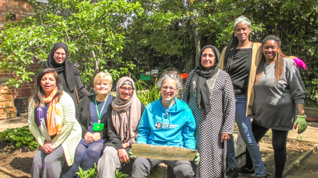 BBOWT Community Officer Barbara Polonara with members of the Slough Ujala Foundation community in the new community garden. Picture: Pete Hughes