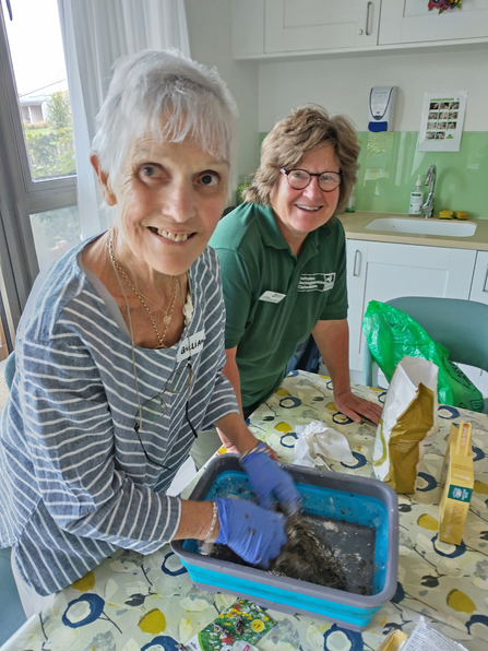 A project participant making seed bombs as part of the Engaging with Nature programme