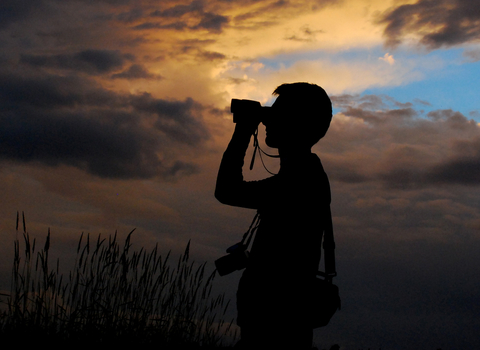 Man with binoculars