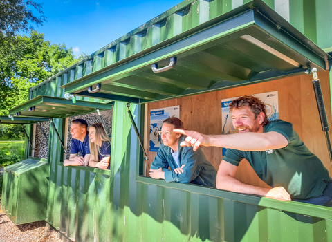 Staff from BBOWT and Grundon in the new lakeside bird hide at the Nature Discovery Centre