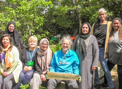 BBOWT Community Officer Barbara Polonara with members of the Slough Ujala Foundation community in the new community garden. Picture: Pete Hughes